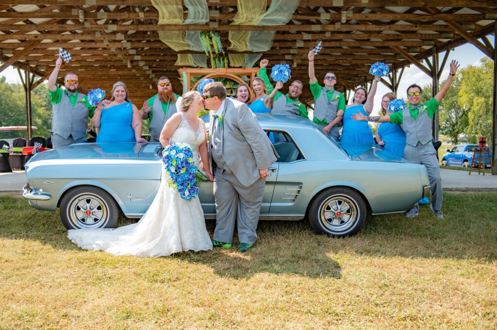 Wedding photo in front of car at VIR