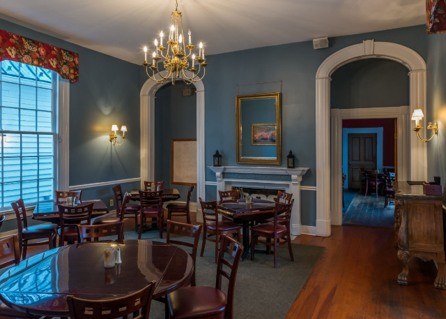 a room with tables and chairs