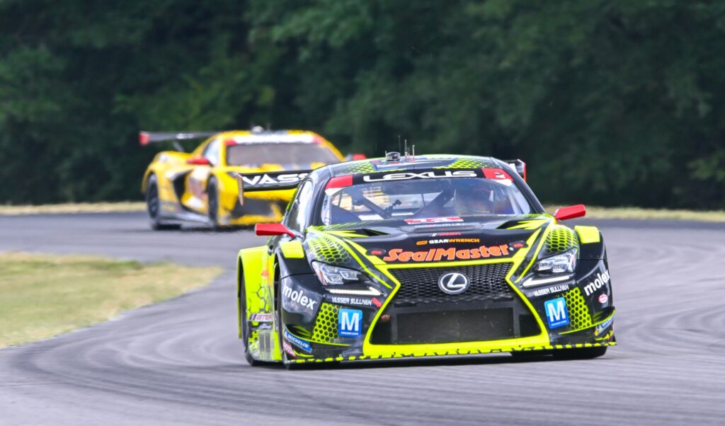 neon yellow and black Lexus Racing Vasser Sulivan Team race car raving at virginia international raceway