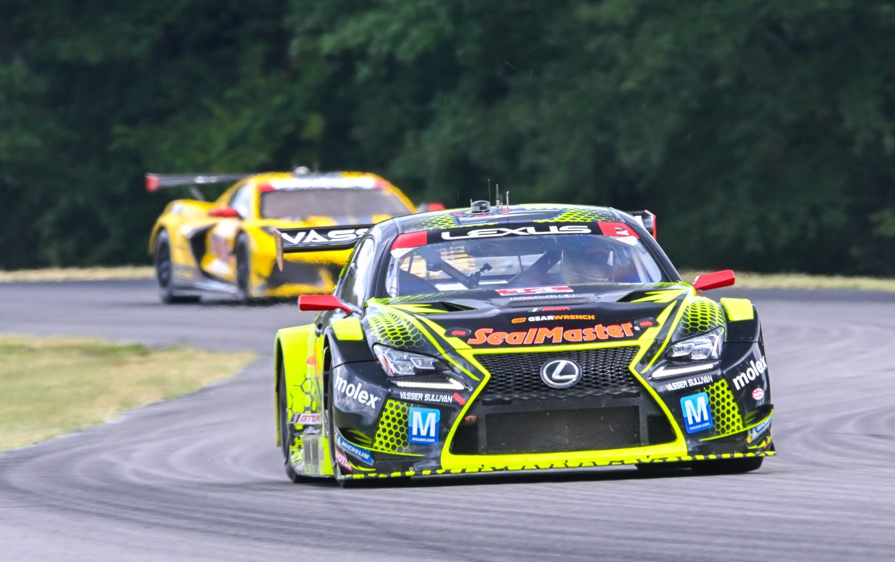 neon yellow and black Lexus Racing Vasser Sulivan Team race car raving at virginia international raceway