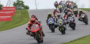 Steel Commander Corp MotoAmerica multiple motorcycle riders on a racecourse