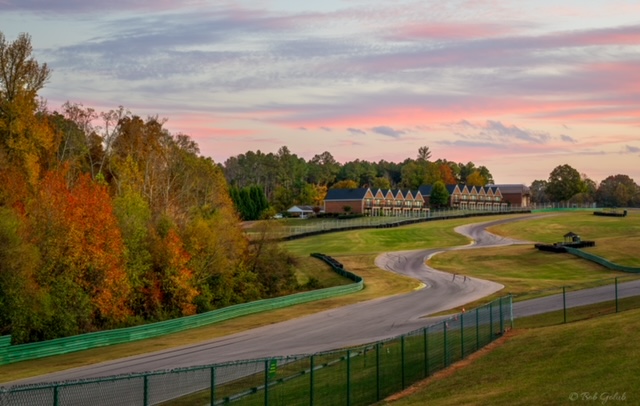 outside shot of racetrack with Villas and sunset at VIR