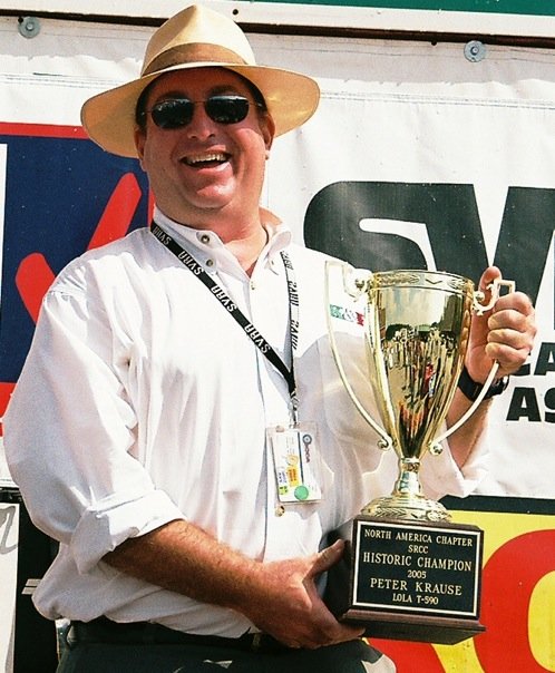 Peter Krause holding trophy in 2005