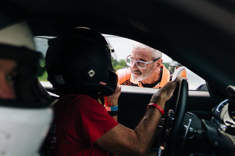 driving instructor giving coaching tips